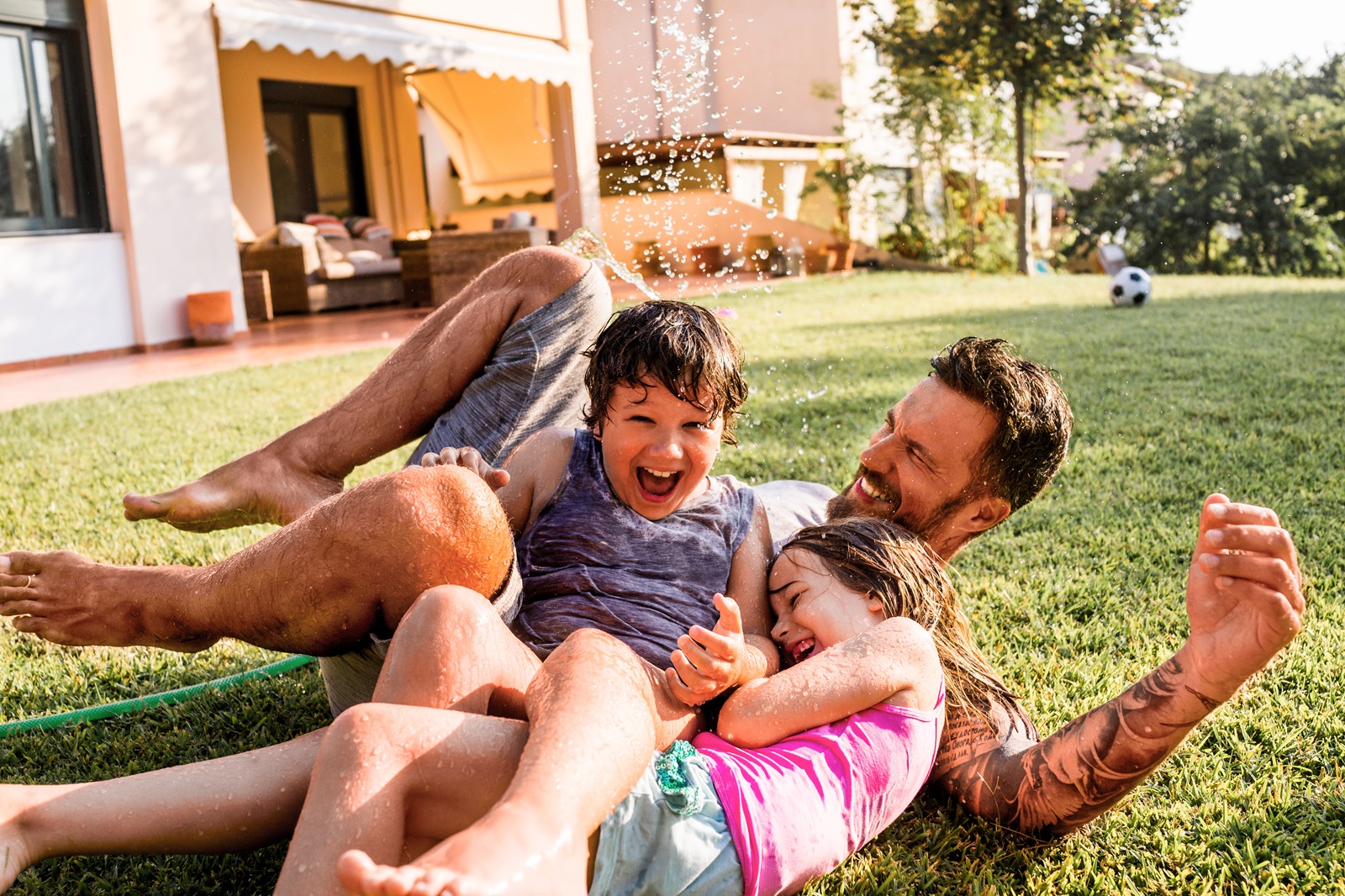 family having fun backyard