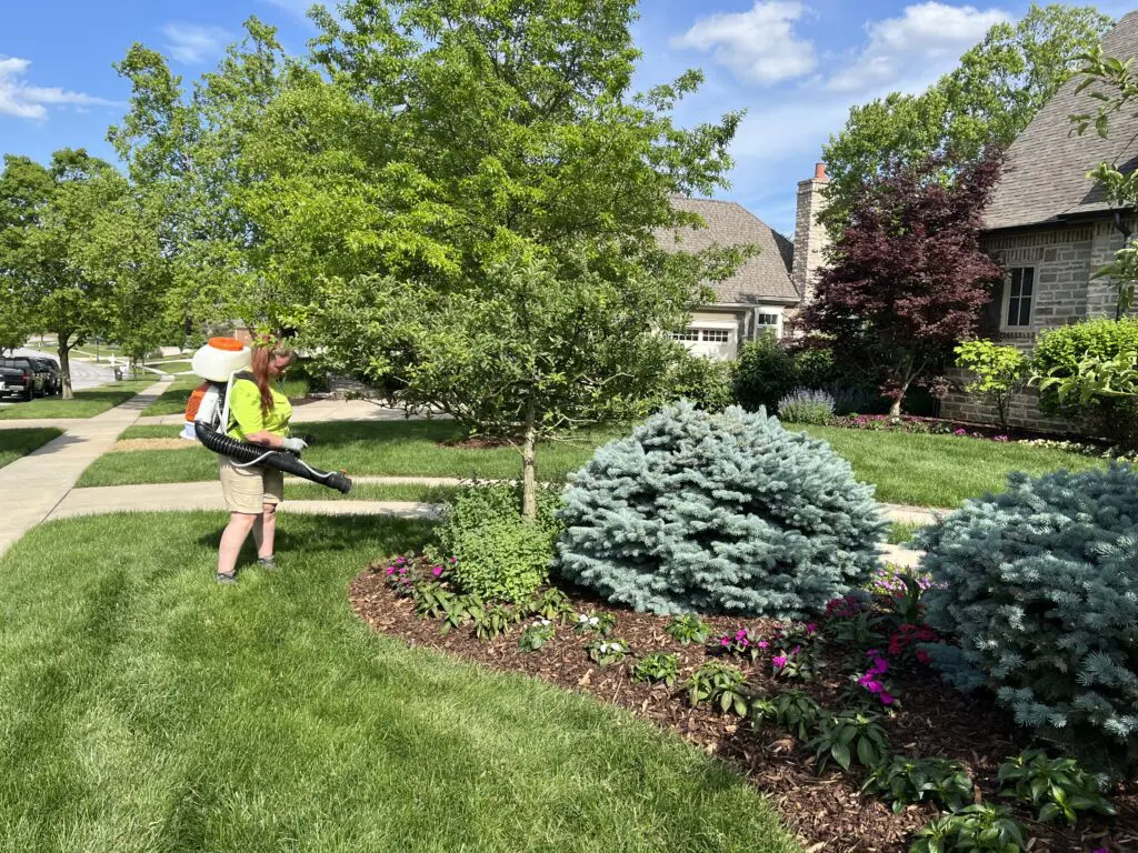 ohdeer nw columbus technician spraying deer repellent