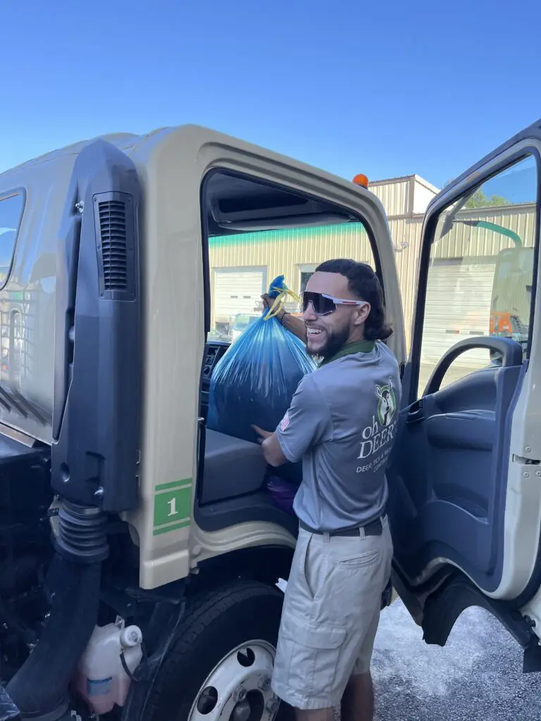 ohDEER technician loading donated coats into truck 