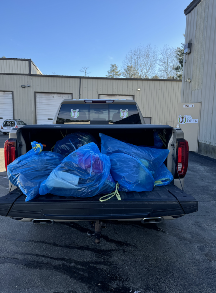 ohDEER truck with donated coats in the trunk 