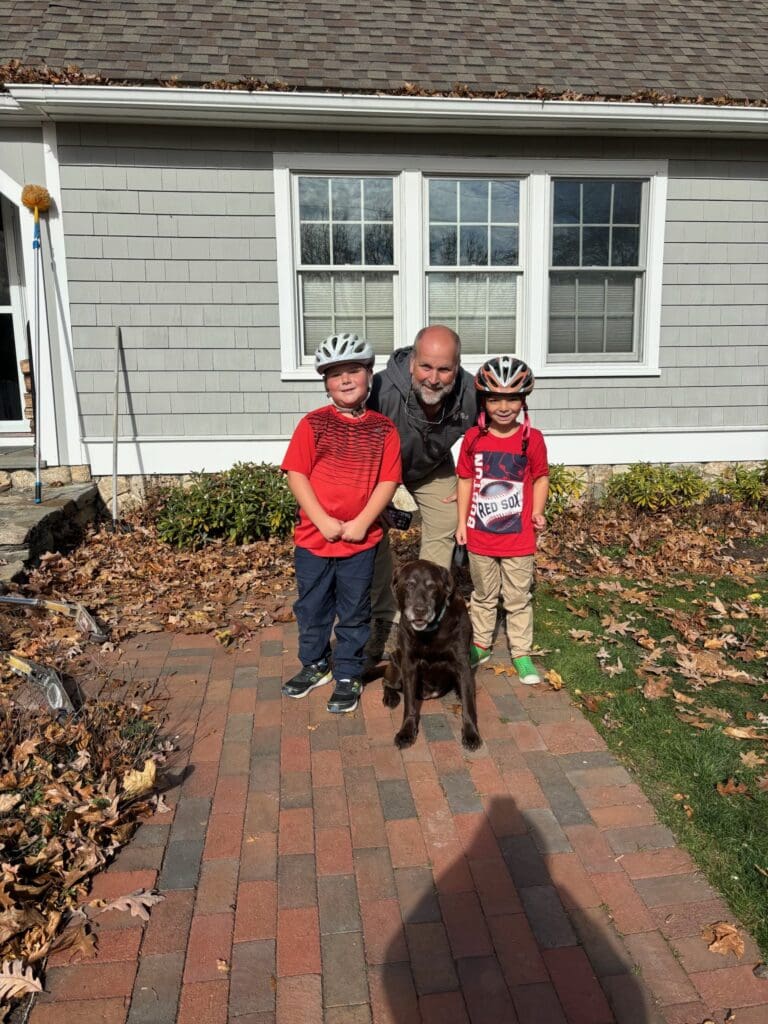 kurt with kids and dog outside 