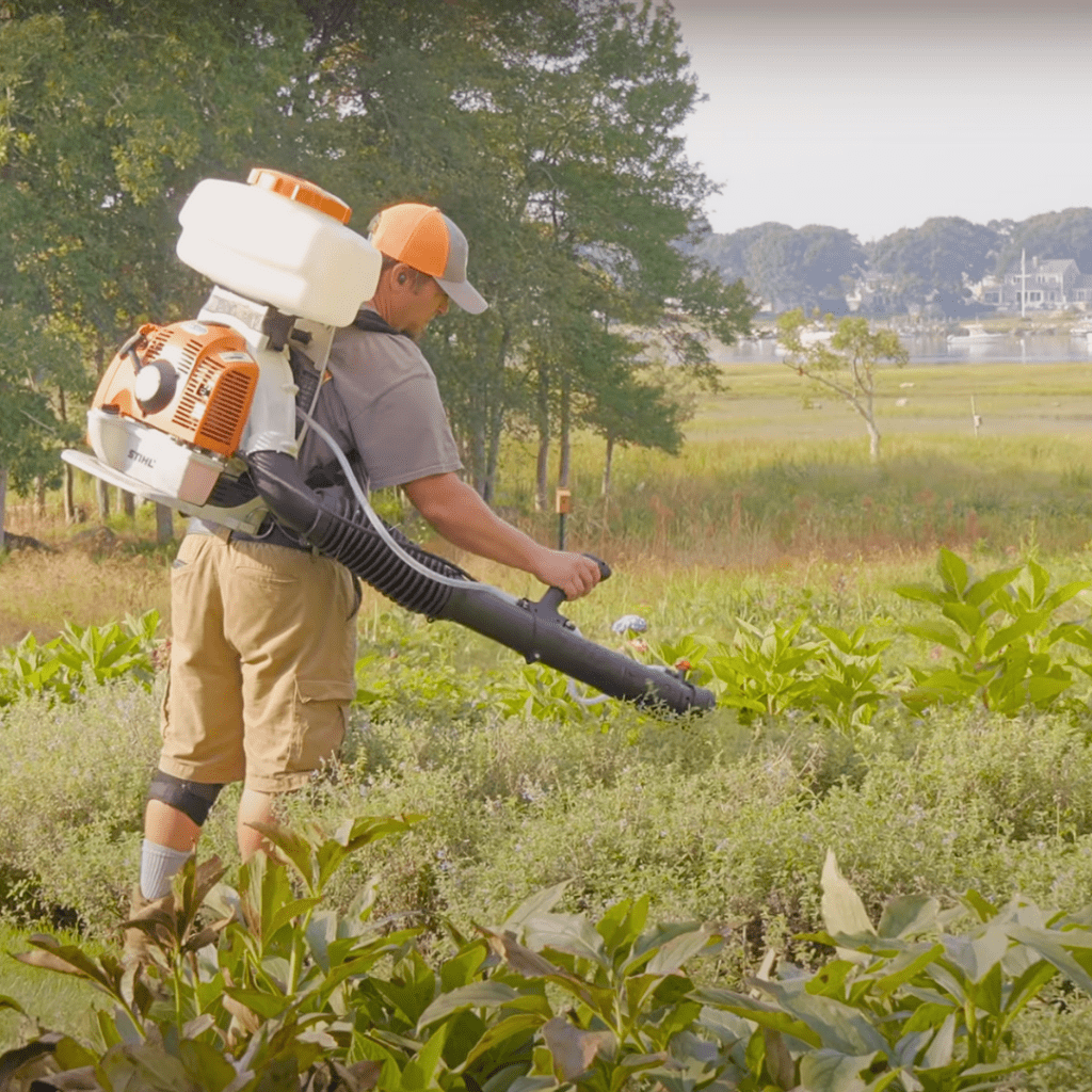 ohDEER Southeastern MA & Northern RI owner Derek Lodi spraying All-Natural Deer Control 
