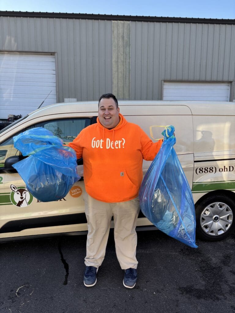 John Avino general manager of ohDEER Metro West holding collected coats from coat drive